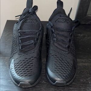Nike Black Sneakers with Mesh Upper and Cushioned Midsole